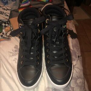 Black High-Top Sneakers with Gold Accents